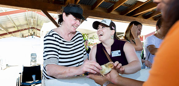 two woman laughing having a great time